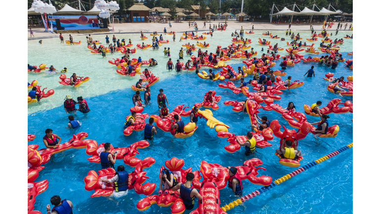 People Play At Water Park In Wuhan