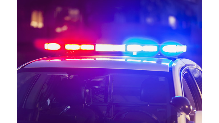 Flashing lights on top of police patrol car