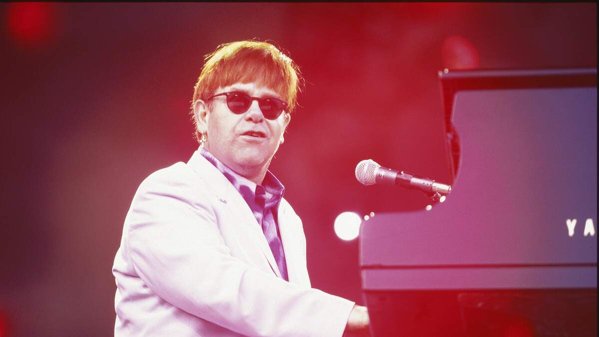 Coolest Dad and Child Costume: Elton John and Piano