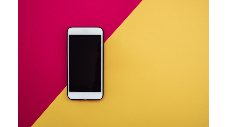 Smartphone on colorful background