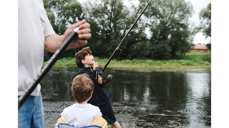 Grandfather and grandson on fishing