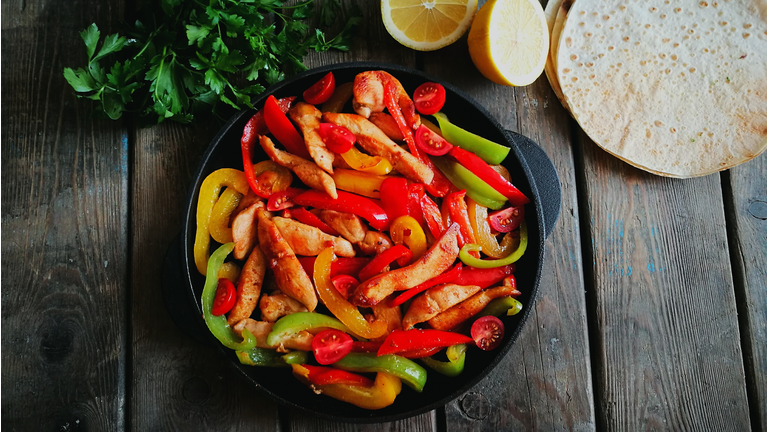 Food Served In Pan On Table