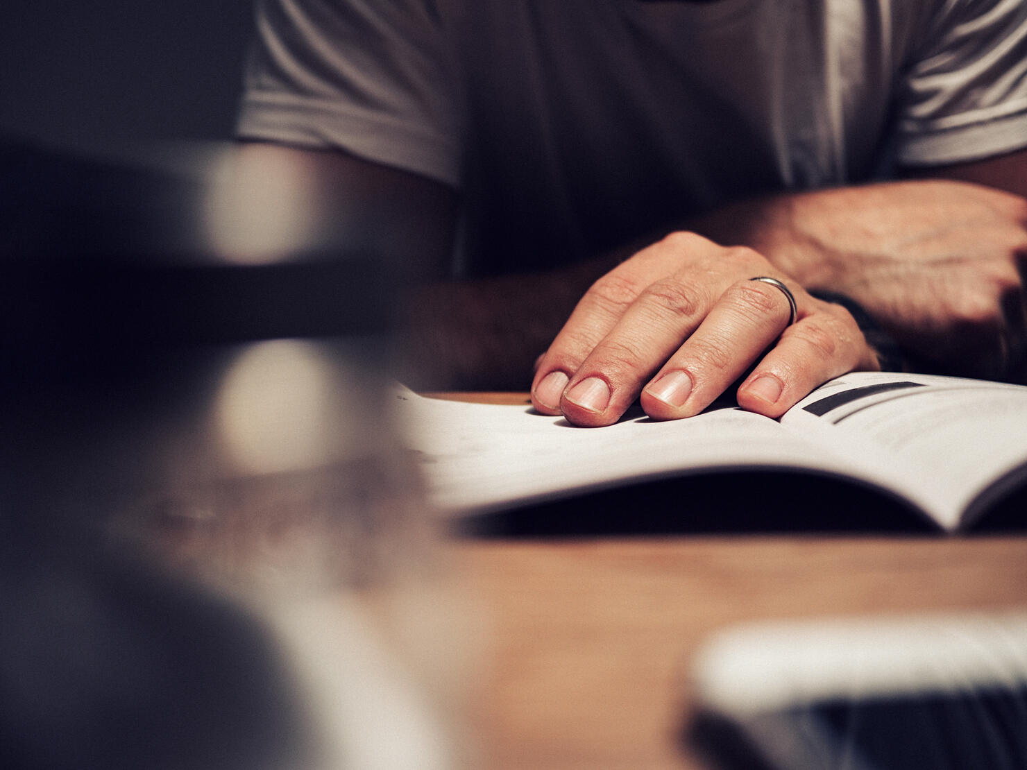 Man reading manual book
