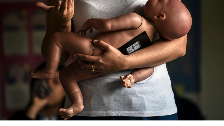 TOPSHOT-COLOMBIA-EDUCATION-BABY-ROBOTS
