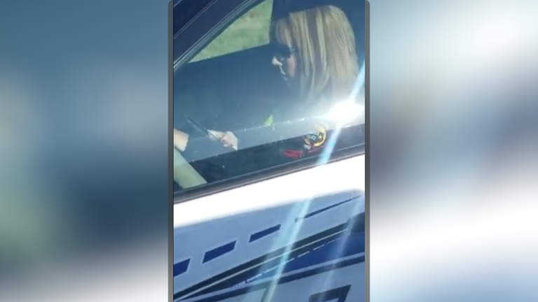 cop spotted texting and driving 