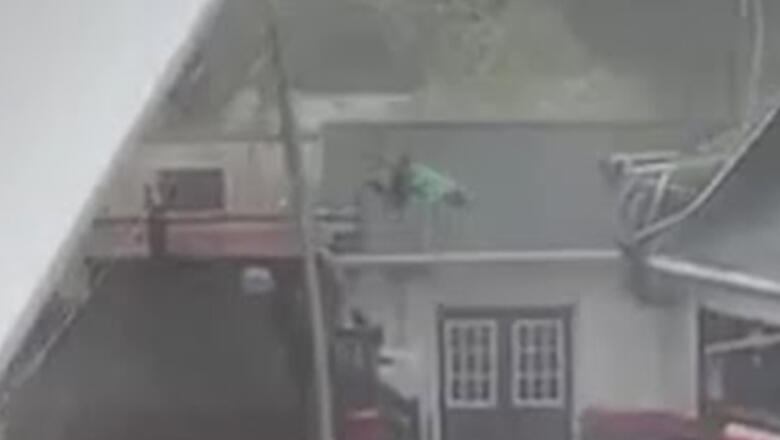 High Winds Send Worker Flying Onto Roof As He Tries To Secure Large Tent - Thumbnail Image