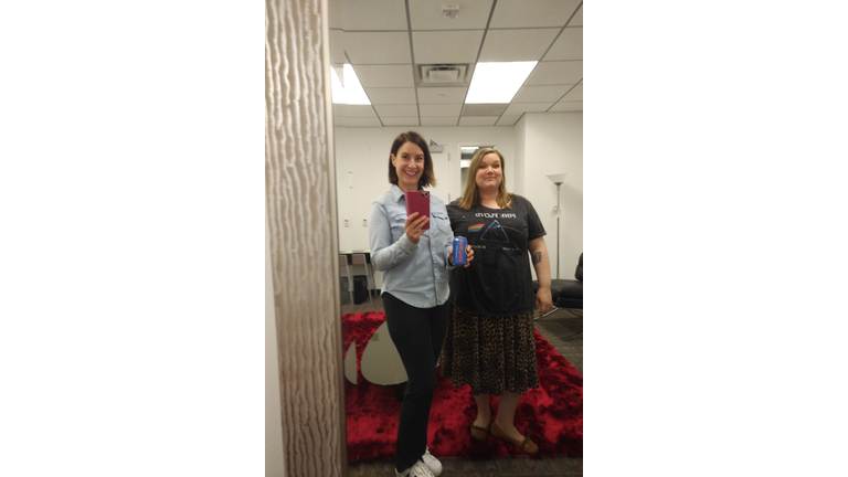 Sarah and Amanda takin' selfies with beer