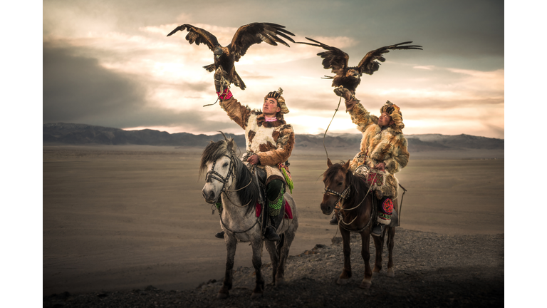 Eagle-hunters on the horse in Mongolia