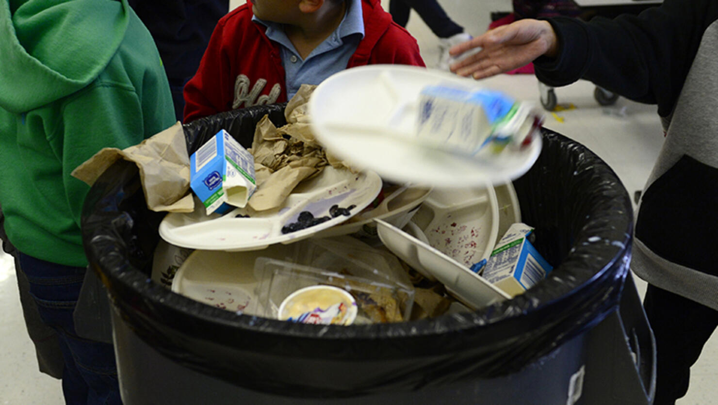 Students from SOAR at the Evie Garrett Dennis Campus of Denver Public Schools eat their lunch in the school cafeteria on Friday, Oct. 30, 2015.