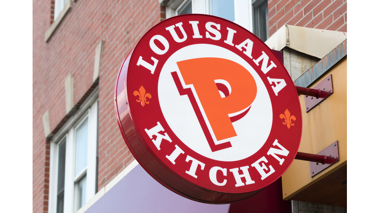 Popeyes Lousiana Kitchen sing or logo outside a restaurant