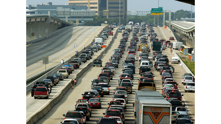 Vehicles jam the northbound lanes (R) of