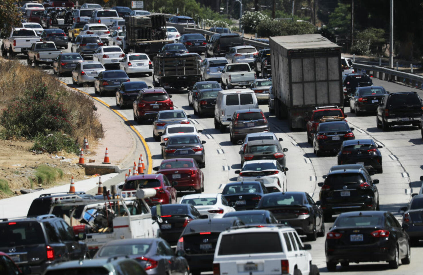 Traffic Builds As Travelers Hit The Road Ahead Of Labor Day Weekend