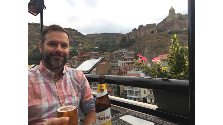 Matt in Tbilisi with Georgian beer