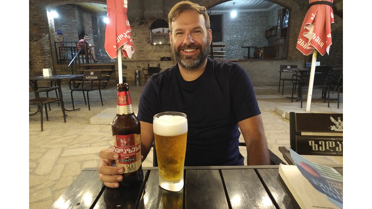 Matt drinking Georgian Beer