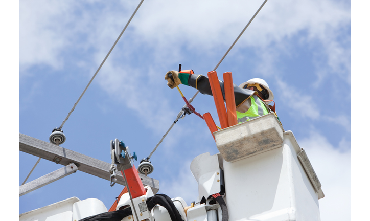 Electric Utility Lineman Cuts Jumper Wire Connection