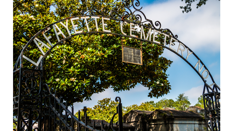 The Cast Iron Gate and Sign of Lafayette Cemetery in New Orleans