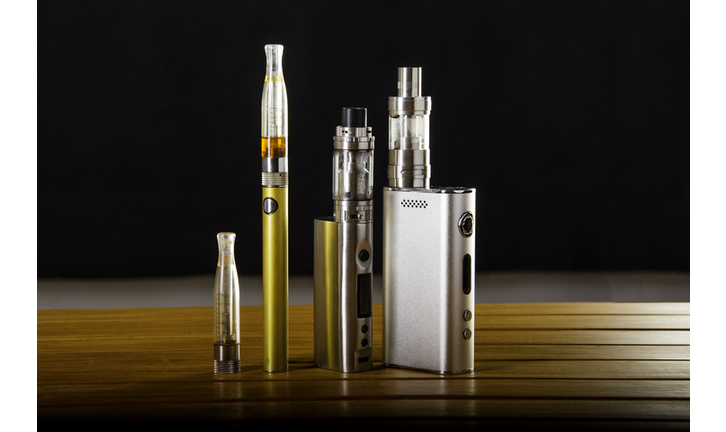 vape devices and electronic cigarette, ecig and mods over a black background.