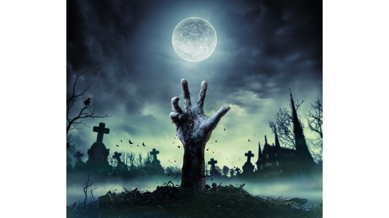 Zombie Hand Rising Out Of A Grave