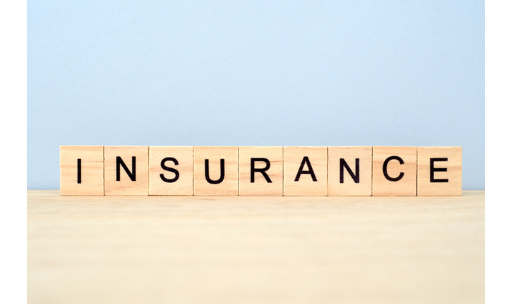 Insurance Word on Wooden Tile Block