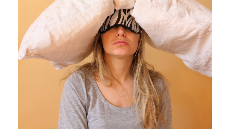 Young women with pillow