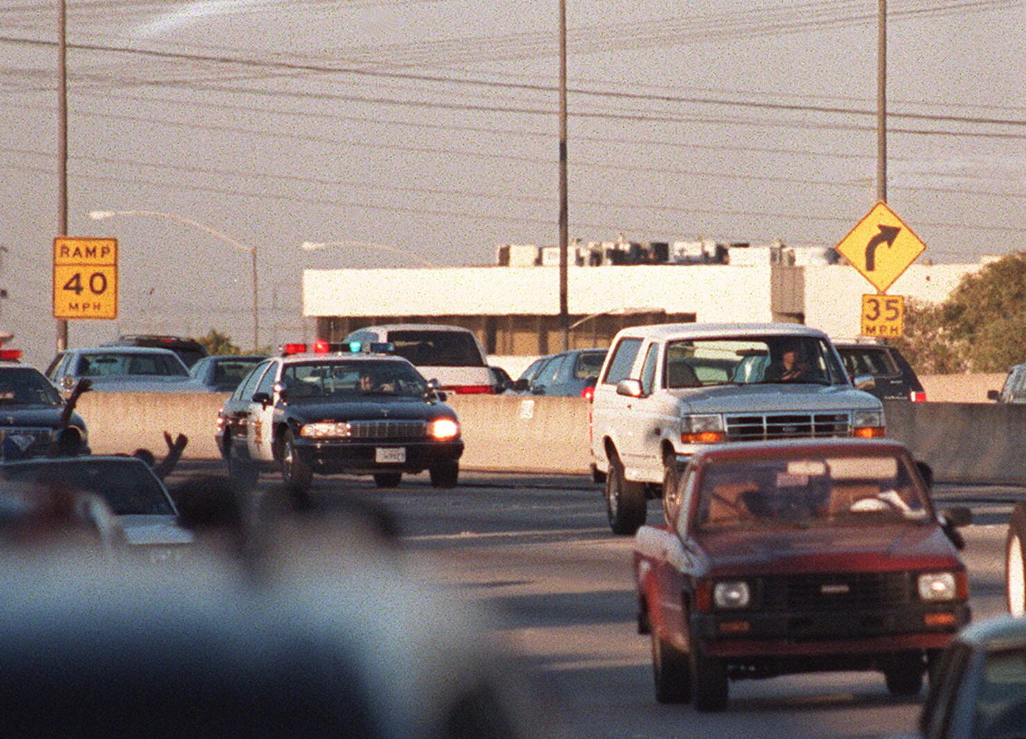 Motorists Wave At O.J. Simpson During Police Freeway Pursuit