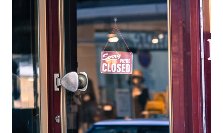 Close-Up Of Closed Sign At Store