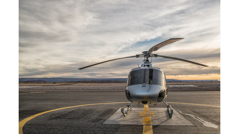 Helicopter on landing pad at dusk, Las Vegas, Nevada, USA
