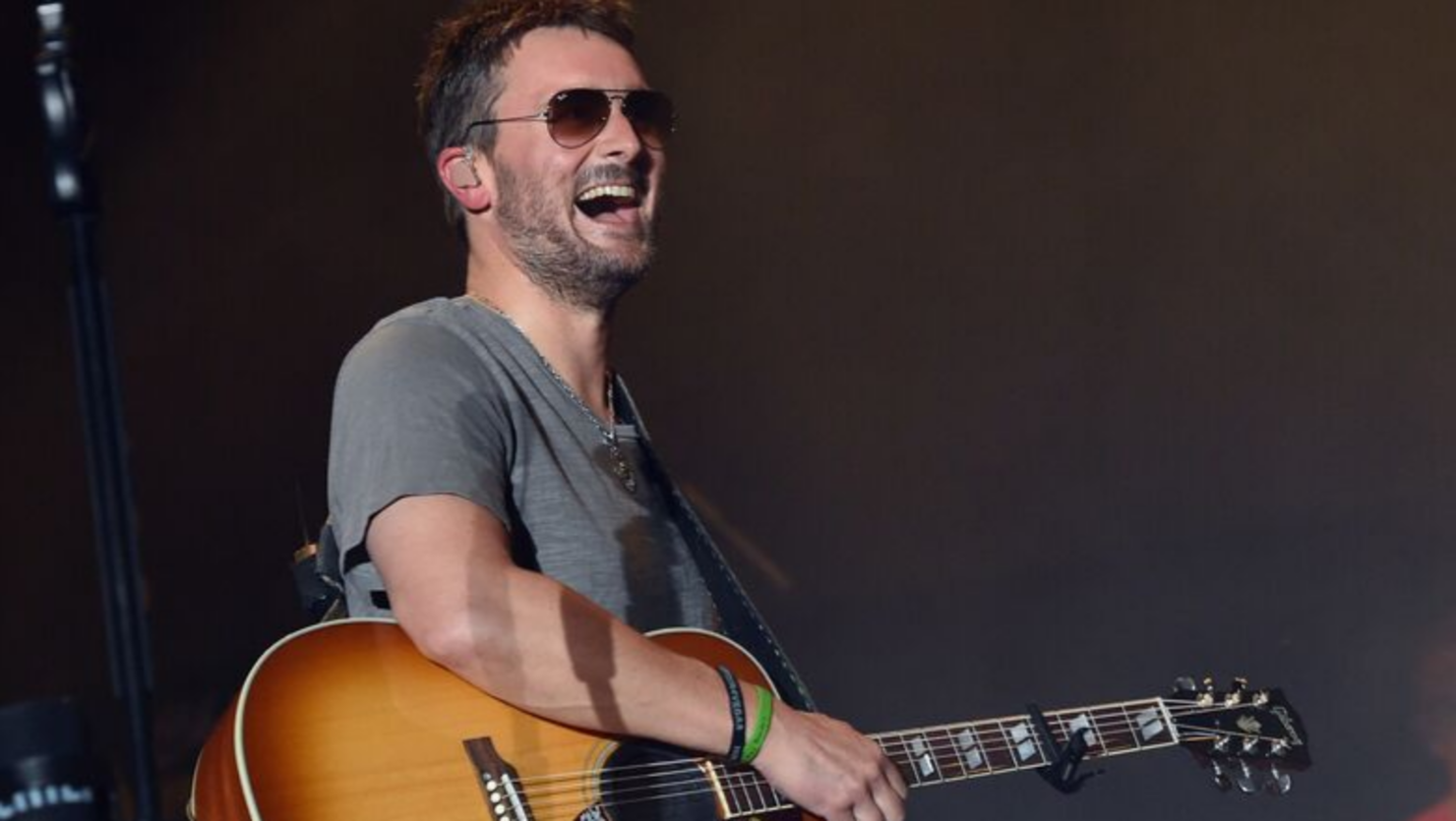 Eric Church Sees Little Girl's Sign, Donates $10,000 To Her School