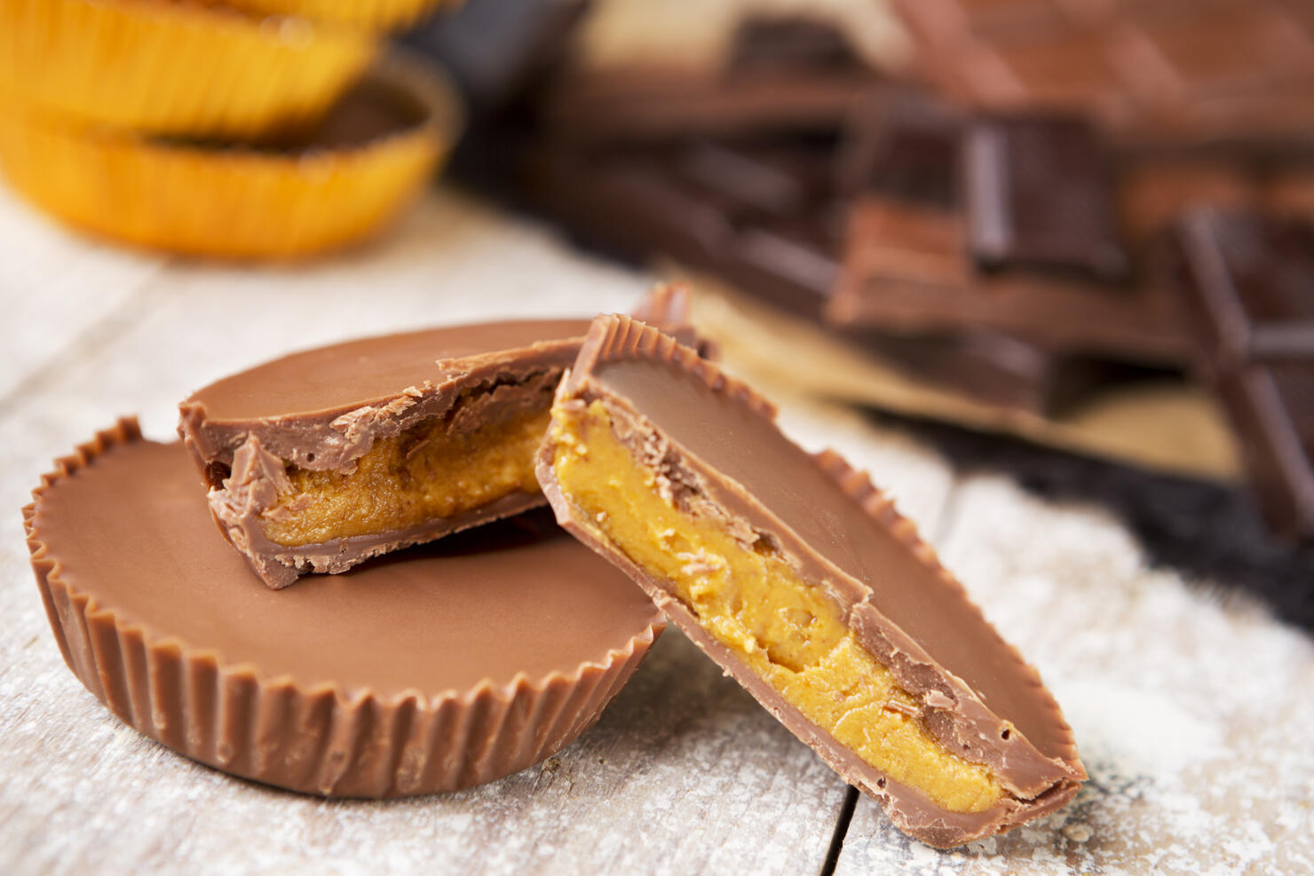 Homemade peanut butter cups on a rustic table