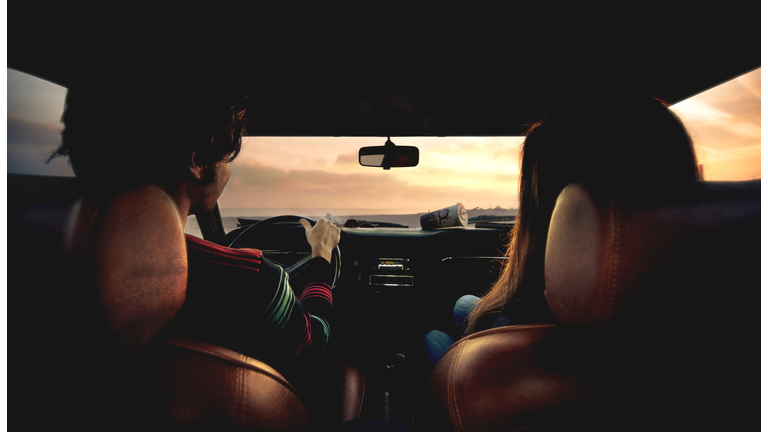 Couple sitting in car