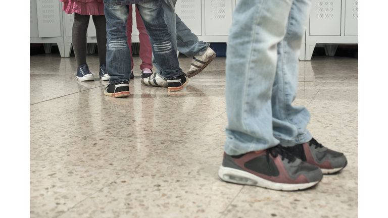 Schoolboy being bullied by his classmates in school, Bavaria, Germany