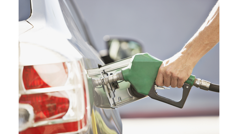 Man pumping gas