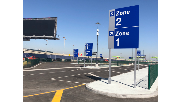 LAX-it is located on the Lower/Arrivals Level just east of Terminal 1, at the corner of World Way and Sky Way, and is accessible by either walking from the terminals or a dedicated shuttle that will circulate through the Central Terminal Area. The LAX-it shuttles will operate in a dedicated lane on the Lower/Arrivals Level so they will not compete with other airport traffic, officials said. The shuttles will arrive every three to five minutes during peak hours, according to the airport. To accommodate the new dedicated bus lane, the traffic pattern on the Lower/Arrivals Level will change simultaneously with LAX-it opening. Private vehicles will no longer have access to the inner lanes, which will be reserved for LAWA-operated shuttles and FlyAway buses. New passenger pickup areas are being designated along the Lower Level outer commercial island, and they will include number/level combinations on the columns to assist motorists in locating guests. The LAX-it lot will feature restrooms and a changing station, as well as benches, umbrellas for sun and rain protection and local food trucks. LAX- it will also offer cellphone charging stations and free public Wi-Fi. The move out of the terminal area has been met with disdain by taxi drivers. The Taxi Workers Association of Los Angeles has blasted the change as a devastating blow to an industry already struggling to compete with app-based services such as Lyft and Uber. The association, which claims that curbside terminal pickup is the single advantage the taxi industry has over the ride- hailing services, is planning a protest Tuesday in conjunction with the lot's opening. Ride-hailing services have been restricted to making pickups and dropoffs at designated areas on the upper level of the terminal area. Cab drivers also contend the LAX-it lot is too small with limited entrances and exits, likely leading to long lines of vehicles trying to get in and out of the facility.