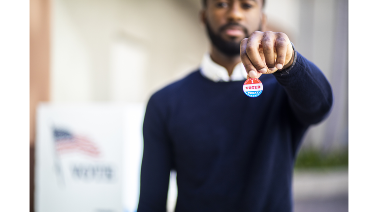 Young Black Man with I voted Sticker