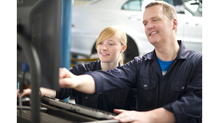 helping out at the garage