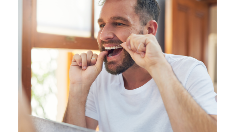 Take your dental hygiene routine a step further by flossing