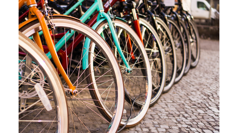 Close-Up Of Bicycle Parked On Paving Stone