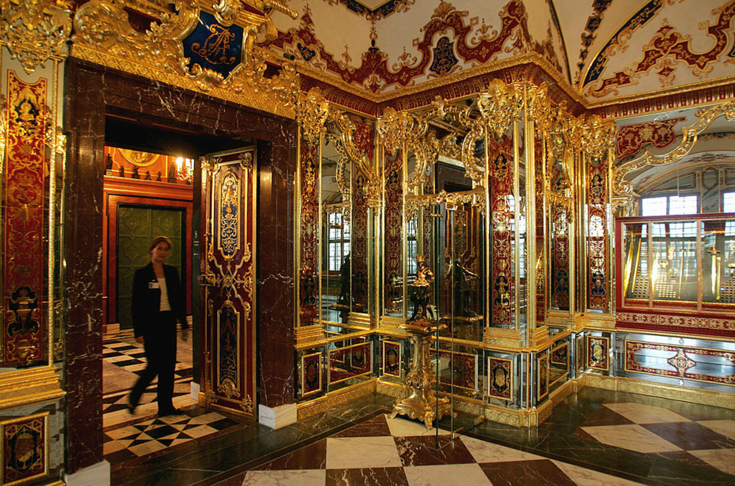 A woman enters the Jewel room of the Gre