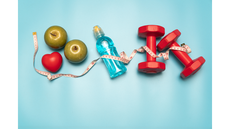 Fitness equipment. Healthy food. water,apple