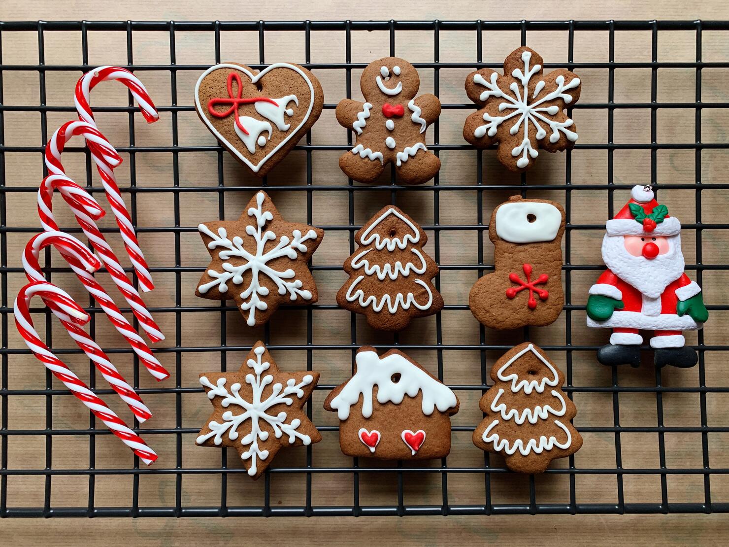 High Angle View Of Cookies And Candy Canes On Cooling Rack