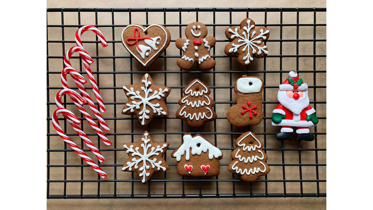 High Angle View Of Cookies And Candy Canes On Cooling Rack