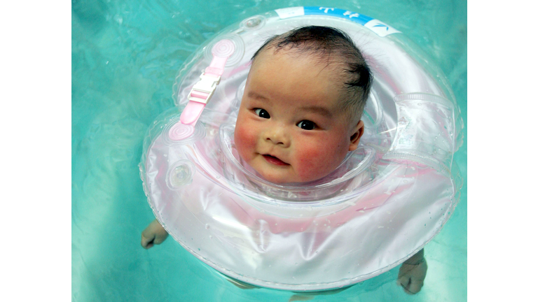 Babies Receive Swimming Care At A Hospital