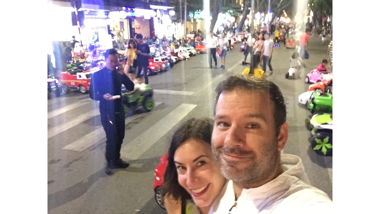 Kids on motorized mini cars