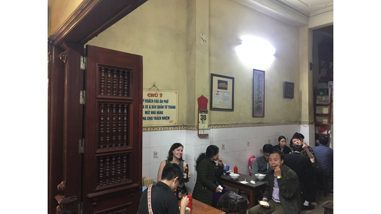 Enjoying a beer and Pho