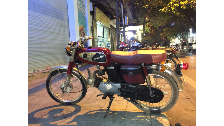 So many scooters and motorbikes.  This one is super cool