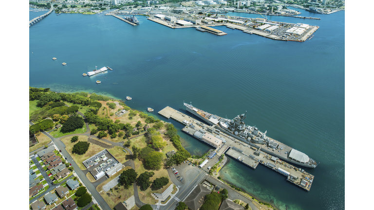 Aerial view of Arizona Memorial and Mighty Mo Missouri battleship at Pearl Harbor, Honolulu, Hawaii, USA