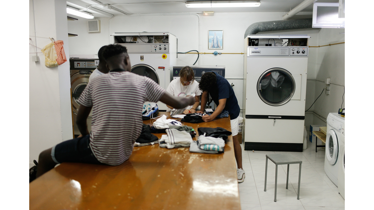 Teens doing laundry