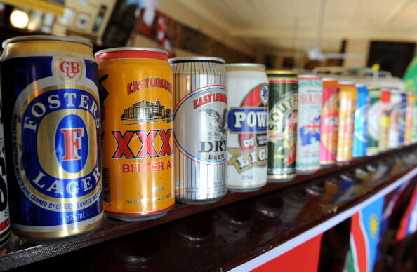 An empty can of Foster's Lager (L) adorn