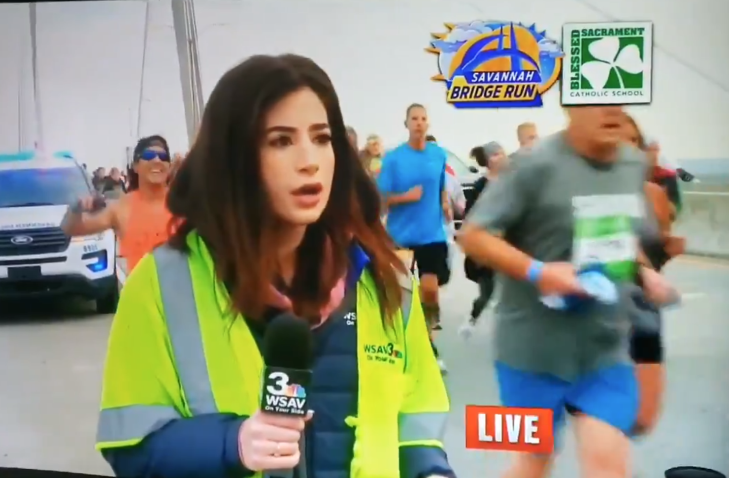 runner smacks reporter's butocks charged