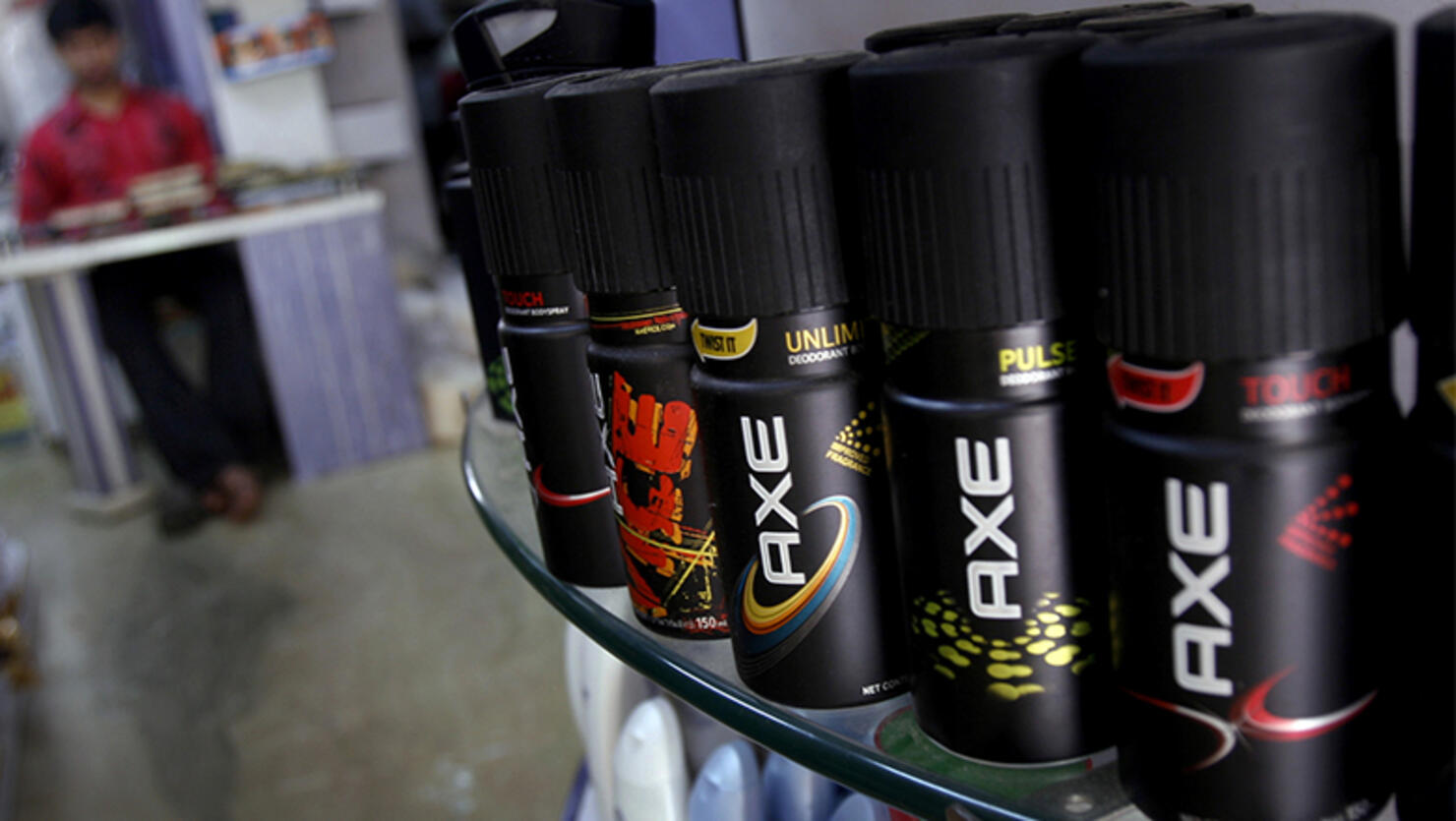 Cans of Axe body spray, made by Hindustan Unilever Ltd., sit